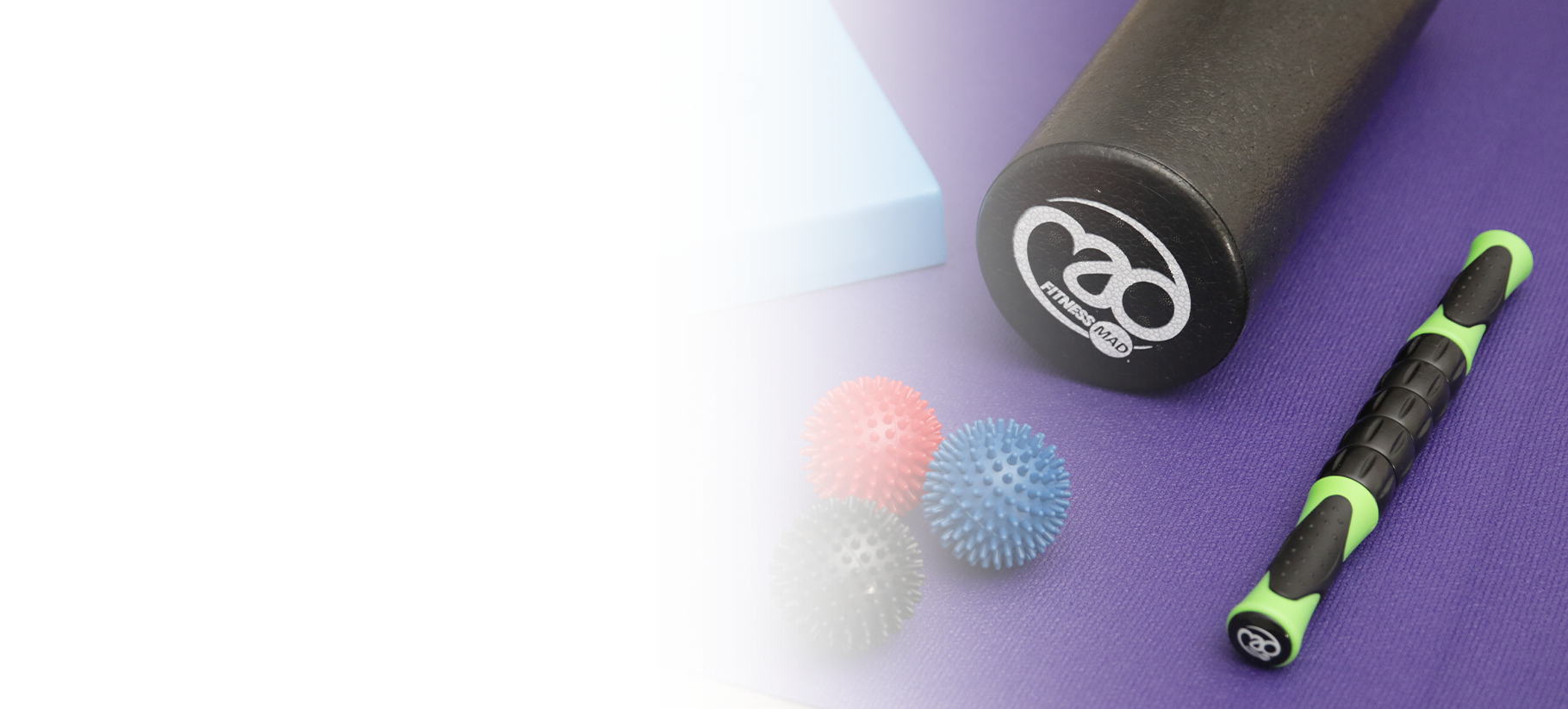 Picture with foam roller, massage balls, yoga block